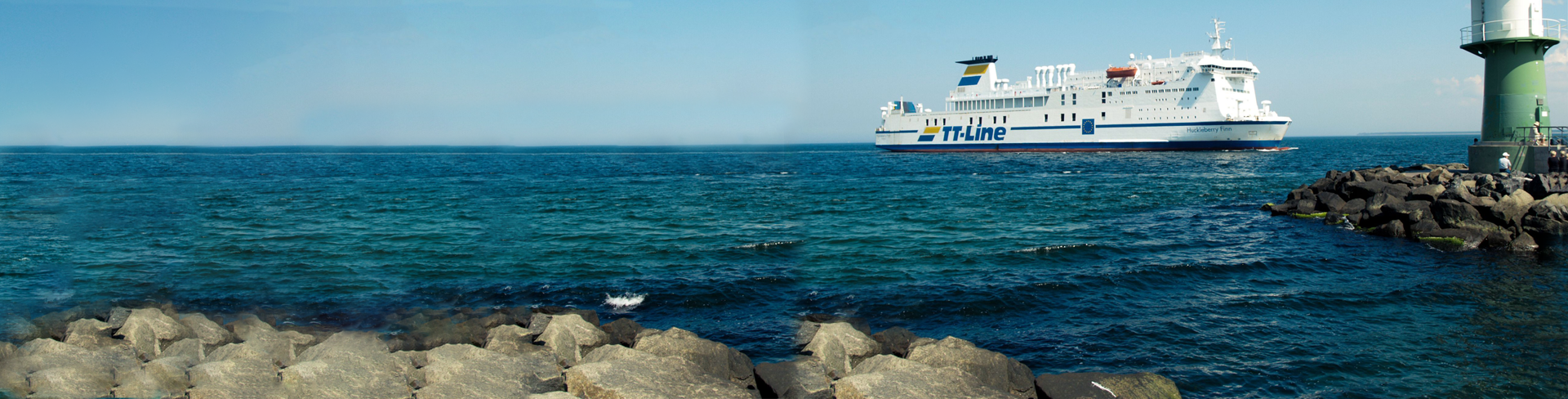 Port-Rostock-TT-Line-ferry-Huckleberry-Finn-at-sea-vuurtoren