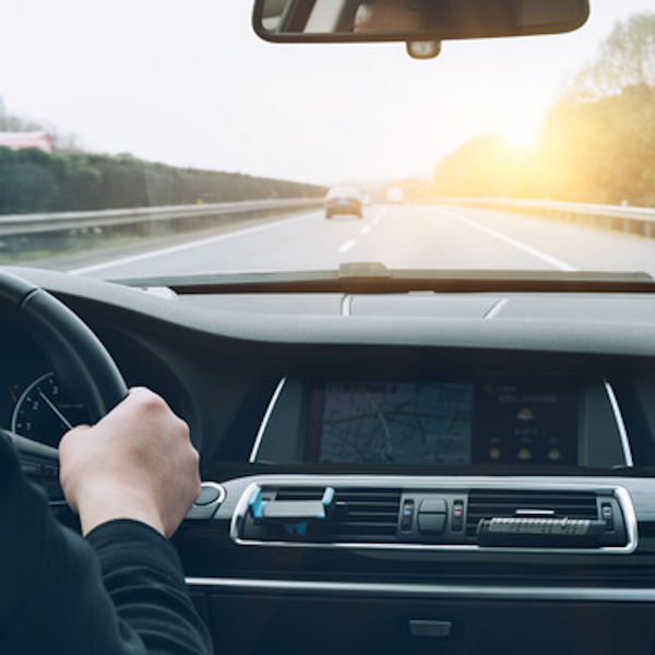 Man driving on highway